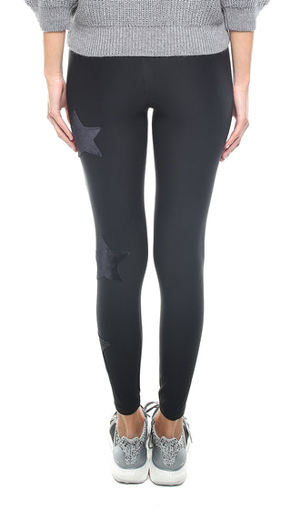 Leggings in lycra nero con stelle applicate di velluto nero e in lurex - L'Equilibriste